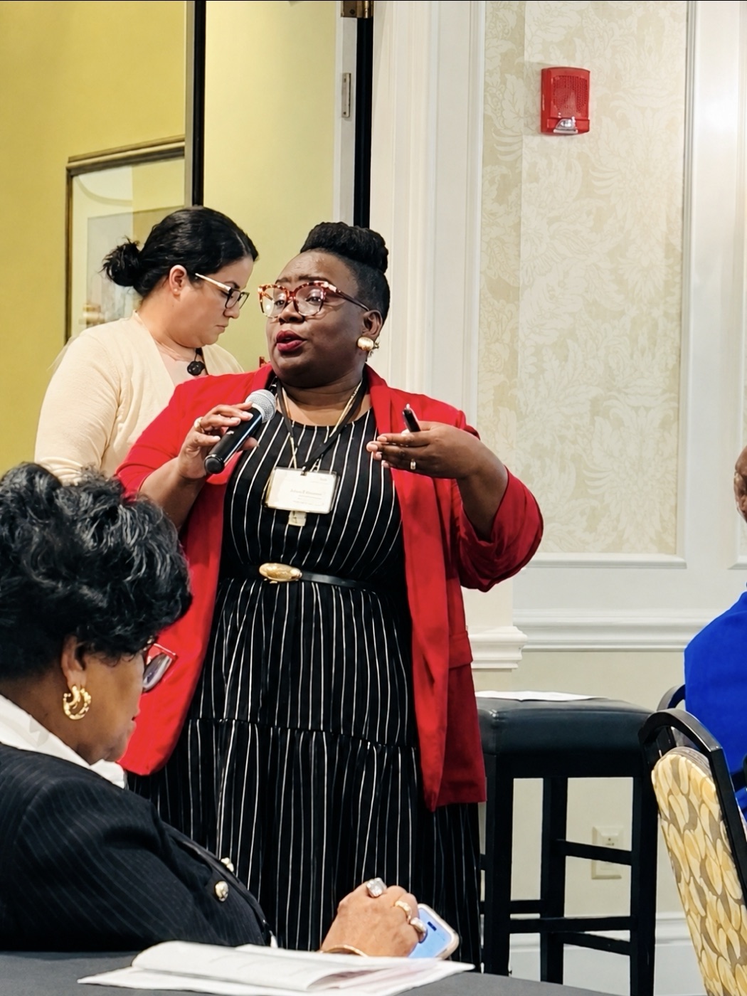 Dr. Takiwi presenting at a leadership session